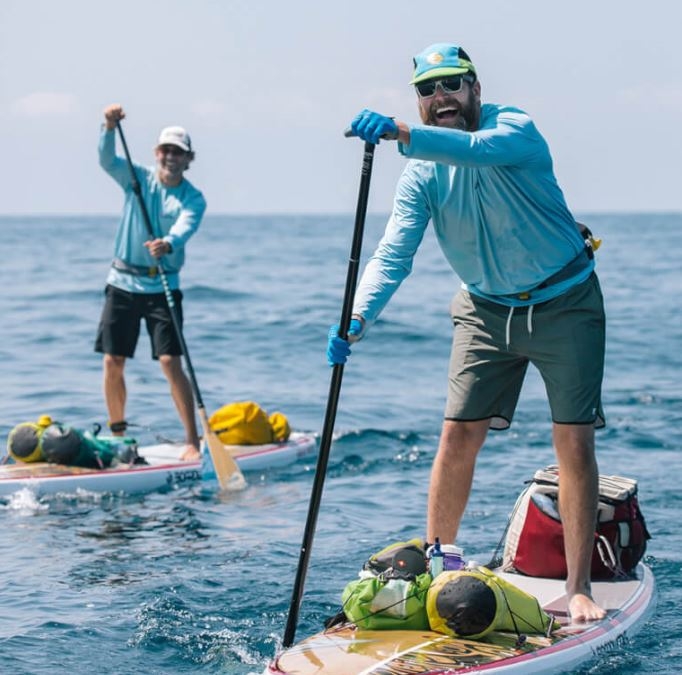 Previous Outdoor Adventures staff raises funds, crosses Lake Michigan on paddleboard